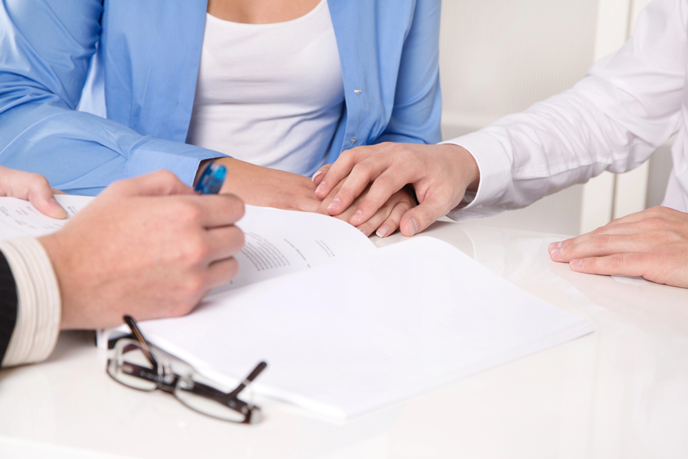 Peoria nursing home abuse lawyer consulting with a concerned family